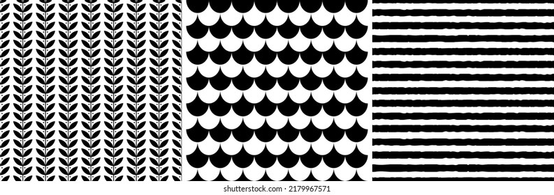 Brush stripes, scales, abstract leaves. Black and white seamless patterns set. Vector.