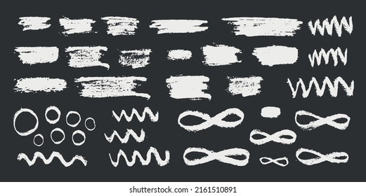 Brush stroke abstract symbol set. Hand drawn vector illustration isolated on black chalkboard background. EPS10