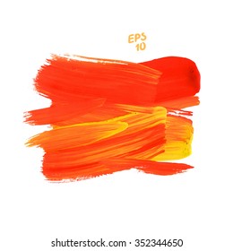 Brush stroke. Acrylic paint stain. Orange stroke of the paint brush isolated on white.