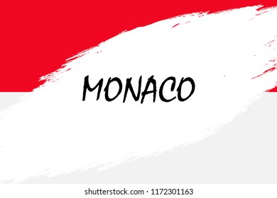 Brush stroke background with Grunge styled flag of Monaco