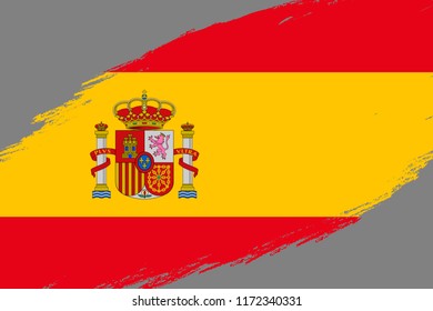 Brush stroke background with Grunge styled flag of Spain