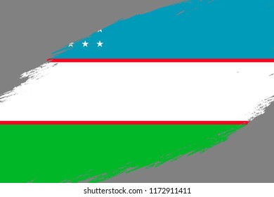 Brush stroke background with Grunge styled flag of Uzbekistan