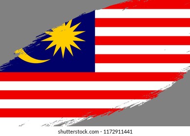 Brush stroke background with Grunge styled flag of Malaysia