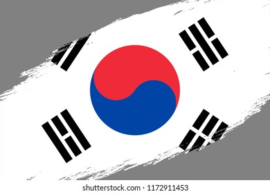 Brush stroke background with Grunge styled flag of South Korea