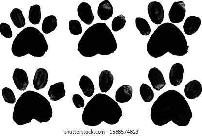 Brush stroke black cat footprints design elements. Isolated on a white background.