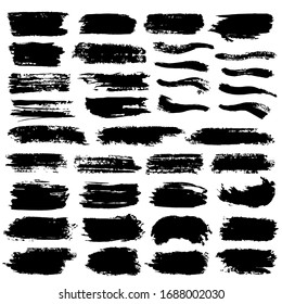 Brush stroke collection. Hand drawn black ink, paint, brushstroke smears set. Various freehand texture isolated on white background. Grunge concept design element group. Vector abstract decoration