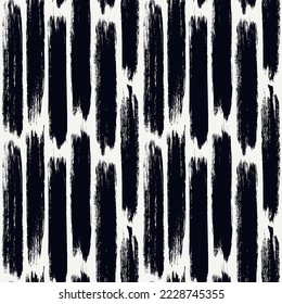 Brush stroke seamless pattern. Paint smears surface print. Hand drawn ink vertical rough edge stripes. Freehand texture background. Grunge concept design wallpaper. Vector abstract graphic art