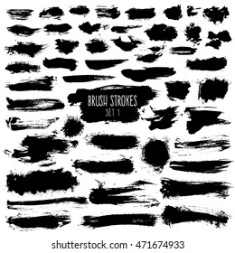 Brush stroke set. Black hatches of different shapes on white background. Isolated hand-drawn elements.