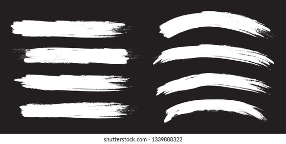 Brush stroke set isolated on black background.Collection of brush stroke for white ink paint, grunge backdrop, dirt banner,watercolor design and dirty texture.Creative art concept, vector illustration