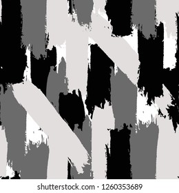 Brush strokes background from painted strips. Grunge seamless pattern. Sketchy hand drawn graphic print. Black and White background. Grungy decoration. Vector design. Distress texture