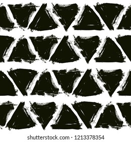 Brush strokes background from triangles. Grunge seamless pattern. Sketchy hand drawn graphic print. Black and White background. Grungy decoration. Vector design. Distress texture