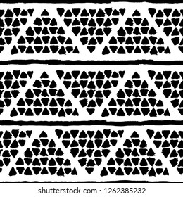 Brush strokes background from triangles. Grunge seamless pattern. Sketchy hand drawn graphic print. Black and White background. Grungy decoration. Vector design. Distress texture