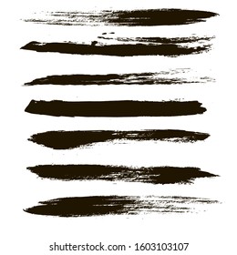 Brush strokes. Paint lines grunge collection. Set of black grungy hand painted brush strokes isolated on white. Abstract ink texture, mascara smudge, makeup eye pencil set.
