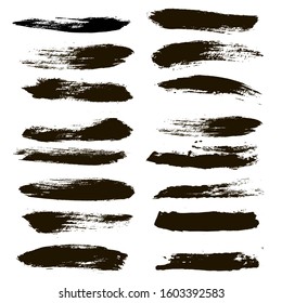 Brush strokes. Paint lines grunge collection. Set of black grungy hand painted brush strokes isolated on white. Abstract ink texture, mascara smudge, makeup eye pencil set.