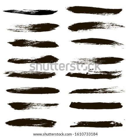 Brush strokes. Paint lines grunge collection. Set of black grungy hand painted brush strokes isolated on white. Abstract ink texture, mascara smudge, makeup eye pencil set.