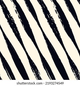 Brush strokes seamless pattern. Freehand diagonal stripes print. Repeated rough edge ink lines background. Simple classic geometric motif. Trendy grunge design. Vector abstract modern wallpaper