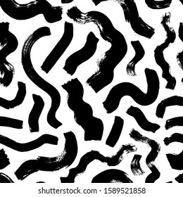 Brush strokes seamless pattern in memphis style. Black paint wavy smears and curly brush strokes. Hand drawn mosaic ink illustration. Wave seamless geometric vector pattern. Black and white texture.