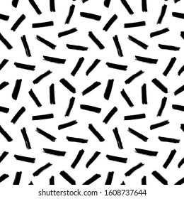 Brush strokes vector seamless pattern in memphis style. Thin lines, dashes and smears. Black and white retro mosaic texture. Hand drawn grunge ink illustration. Geometric black paint seamless pattern.