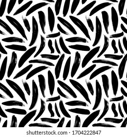 Brush strokes vector seamless pattern. Black paint freehand scribbles,  messy dry brush stroke texture. Chaotic rough smears. Black and white mosaic texture. Hand drawn grunge ink illustration.