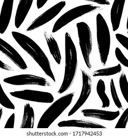 Brush strokes vector seamless pattern. Black paint freehand scribbles,  messy dry brush stroke texture. Chaotic rough smears. Black and white mosaic texture. Hand drawn grunge ink illustration.