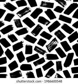 Brush strokes vector seamless pattern. Chaotic rough short smears. Black paint freehand scribbles. Grungy daub, messy brush strokes on white background. Hand drawn grunge ink illustration.