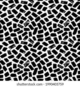 Brush strokes vector seamless pattern. Chaotic rough short smears. Black paint freehand scribbles. Grungy daub, messy brush strokes on white background. Hand drawn grunge ink illustration.