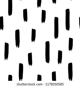 Brush vertical stroke seamless pattern. Watercolor ornament. Grunge scribble black strokes on white background. Texture for print, wallpaper, home decor