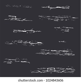 Brushes of an aged surface. Cracked coating, paint