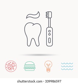 Brushing teeth icon. Electric toothbrush sign. Toothpaste and tooth symbol. Global connect network, ocean wave and burger icons. Lightbulb lamp symbol.