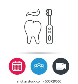 Brushing teeth icon. Electric toothbrush sign. Toothpaste and tooth symbol. Group of people, video cam and calendar icons. Vector