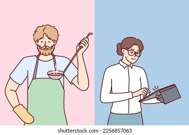 Brutal man preparing food for family while woman doing business or working in office. Girl secretary with tablet computer and bearded guy in apron with ladle of soup in hand