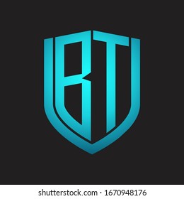 BT Logo monogram with emblem shield design isolated with blue colors on black background