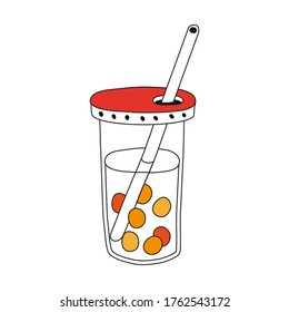 Bubble Tee mit Kugeln in einem Glas mit einem Strohhalm.