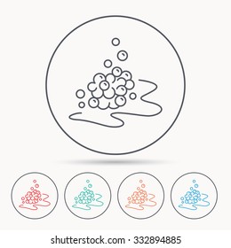 Bubbles icon. Foam for bathing sign. Washing or shampoo symbol. Linear circle icons.