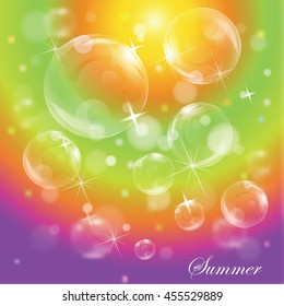 Bubbles on bright colorful rainbow background with glitters and starks