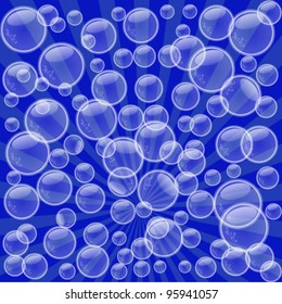 Bubbles. Transparent bubbles flying on a blue background.