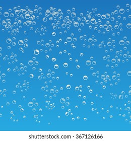 Bubbles in water on blue background