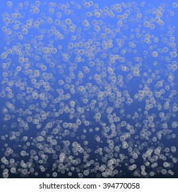Bubbles in water on blue background