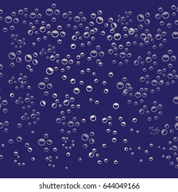 Bubbles in water on blue background