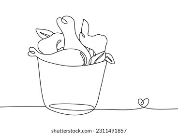 A bucket of fried chicken drumsticks and wings with herbs. Portion of delicious food. One line drawing for different uses. Vector illustration.