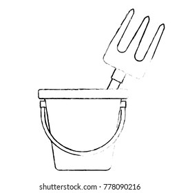 bucket with gardening rake