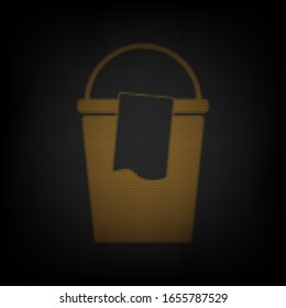 Un cubo y un signo de trapo. Icono de la rejilla de una pequeña bombilla naranja en la oscuridad. Ilustración.