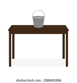 A bucket of water stands on a table on a white background