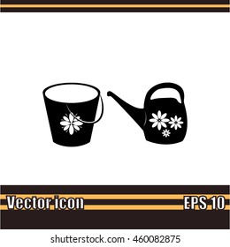 Bucket and watering can vector icon