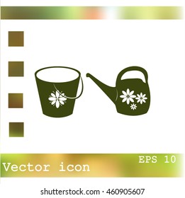 Bucket and watering can vector icon