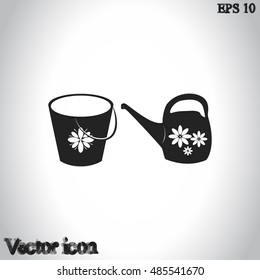 Bucket and watering can vector icon