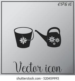 Bucket and watering can vector icon