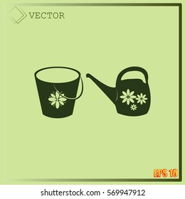 Bucket and watering can vector icon