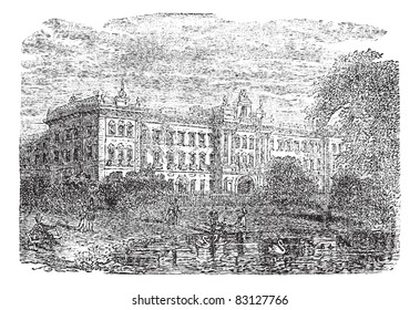 Buckingham Palace or Buckingham House in London, England, during the 1890s, vintage engraving. Illustration of Buckingham Palace with lake and people in front. Trousset encyclopedia (1886 - 1891). svg