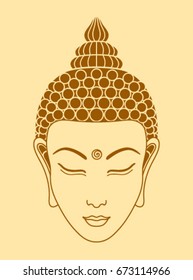Buddha head on a beige background